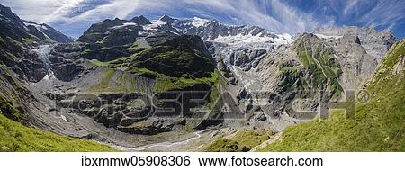 Hiker (right) in the mountains on hiking trail to Grindelwald, left Lower Ice Sea Glacier Grindelwald-Fieschergletscher and summit of Walcherhorn, Bernese Oberland, Switzerland, Europe View Large Photo Image Stock Photograph - Hiker (right) in the mountains on hiking trail to Grindelwald, left Lower Ice Sea Glacier Grindelwald-Fieschergletscher and summit of Walcherhorn, Bernese Oberland, Switzerland, Europe. Fotosearch