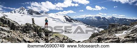 Hiker standing in front of glacier, Glacier du Tour, glacier and mountain peak, high alpine landscape, left Aiguille du Chardonnet, Chamonix, Haute-Savoie, France, Europe View Large Photo Image Stock Photo - Hiker standing in front of glacier, Glacier du Tour, glacier and mountain peak, high alpine landscape, left Aiguille du Chardonnet, Chamonix, Haute-Savoie, France, Europe. Fotosearch