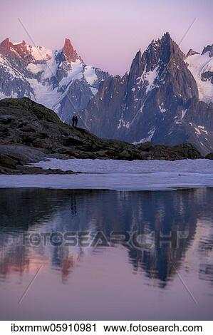 Hikers enjoy the view, evening mood with alpenglow, mountain panorama, mountain peaks, Grandes Jorasses and Mont Blanc massif, Chamonix-Mont-Blanc, Haute-Savoie, France, Europe View Large Photo Image Stock Image - Hikers enjoy the view, evening mood with alpenglow, mountain panorama, mountain peaks, Grandes Jorasses and Mont Blanc massif, Chamonix-Mont-Blanc, Haute-Savoie, France, Europe. Fotosearch