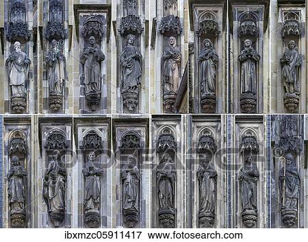Holy and secular sculptures on the church facade of the Lambertikirche, Münster, North Rhine-Westphalia, Germany, Europe View Large Photo Image Stock Photo - Holy and secular sculptures on the church facade of the Lambertikirche, Münster, North Rhine-Westphalia, Germany, Europe. Fotosearch