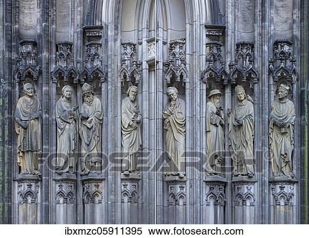 Holy figures left and right at the entrance portal of the Lamberti Church, Münster, North Rhine-Westphalia, Germany, Europe View Large Photo Image Stock Photography - Holy figures left and right at the entrance portal of the Lamberti Church, Münster, North Rhine-Westphalia, Germany, Europe. Fotosearch