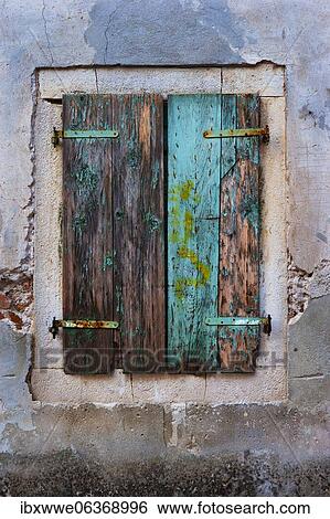 House facade, windows with weathered and closed shutters, old town, Bale, Istria, Croatia, Europe View Large Photo Image Stock Photograph - House facade, windows with weathered and closed shutters, old town, Bale, Istria, Croatia, Europe. Fotosearch