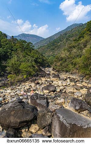 Stock Photography - Huge boulders in a valley, Sohra or Cherrapunjee, Meghalaya, India, Asia. Fotosearch