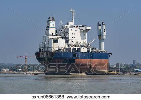 Huge container ship ready to getting break up, Chittagong Ship Breaking Yard, Chittagong, Bangladesh, Asia View Large Photo Image Stock Photo - Huge container ship ready to getting break up, Chittagong Ship Breaking Yard, Chittagong, Bangladesh, Asia. Fotosearch