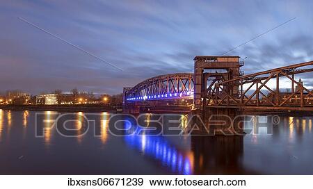 Stock Photo - Illuminated lift bridge over the Elbe, heritage-protected, Magdeburg, Saxony-Anhalt, Germany, Europe. Fotosearch