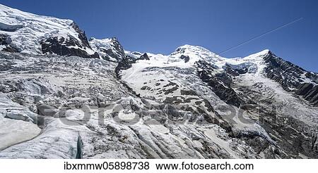 La Jonction, glacier tongue, Glacier des Bossons meets Glacier de Taconnaz, summit of Mont Maudit, Mont Blanc and Aiguille de Bionnassay, Chamonix, Haute-Savoie, France, Europe View Large Photo Image Stock Photo - La Jonction, glacier tongue, Glacier des Bossons meets Glacier de Taconnaz, summit of Mont Maudit, Mont Blanc and Aiguille de Bionnassay, Chamonix, Haute-Savoie, France, Europe. Fotosearch
