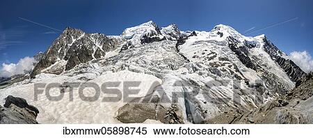 Stock Photography - La Jonction, glacier tongue, Glacier des Bossons meets Glacier de Taconnaz, summit of Aiguille du Midi, Mont Maudit, Mont Blanc and Aiguille de Bionnassay, Chamonix, Haute-Savoie, France, Europe. Fotosearch