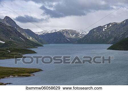 Lake Gjende, view from the Besseggen hike, Jotunheimen National Park, Vågå, Innlandet, Norway, Europe View Large Photo Image Stock Photo - Lake Gjende, view from the Besseggen hike, Jotunheimen National Park, Vågå, Innlandet, Norway, Europe. Fotosearch