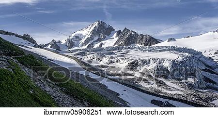 Stock Image - Left Mountain hut Refuge Albert 1er, Mountain panorama, Glacier du Tour, Glacier and mountain peaks, High alpine landscape, Peak of the Aiguille du Chardonnet, Chamonix, Haute-Savoie, France, Europe. Fotosearch