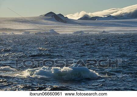 Little icebergs loating before the huge glaciers on Tabarin Peninsula, Antarctica View Large Photo Image Stock Image - Little icebergs loating before the huge glaciers on Tabarin Peninsula, Antarctica. Fotosearch