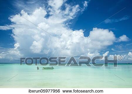 Little motorboat in the turquoise waters of the beautiful lagoon of Funafuti, Tuvalu, Oceania View Large Photo Image Stock Photograph - Little motorboat in the turquoise waters of the beautiful lagoon of Funafuti, Tuvalu, Oceania. Fotosearch