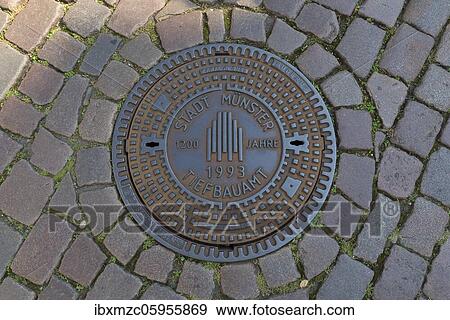 Manhole cover, 1200 years City of Münster, Münster, North Rhine-Westphalia, Germany, Europe View Large Photo Image Stock Photo - Manhole cover, 1200 years City of Münster, Münster, North Rhine-Westphalia, Germany, Europe. Fotosearch