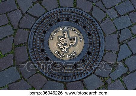 Manhole cover with peace dove, 350 Peace of Westphalia 1648 1998, Münster, North Rhine-Westphalia, Germany, Europe View Large Photo Image Stock Photograph - Manhole cover with peace dove, 350 Peace of Westphalia 1648 1998, Münster, North Rhine-Westphalia, Germany, Europe. Fotosearch