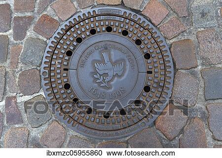 Manhole cover with the symbol of a peace dove on the occasion of the 350th anniversary of the Peace of Westphalia, Münster, North Rhine-Westphalia, Germany, Europe View Large Photo Image Stock Image - Manhole cover with the symbol of a peace dove on the occasion of the 350th anniversary of the Peace of Westphalia, Münster, North Rhine-Westphalia, Germany, Europe. Fotosearch