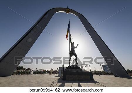 Stock Image - Monument of Independence, in backlight, Place de la Nation, N'Djamena, Chad, Africa. Fotosearch