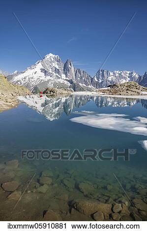 Mountain panorama, ice floe on Lac Blanc, mountain peaks reflected in mountain lake, Grandes Jorasses and Mont Blanc massif, Chamonix-Mont-Blanc, Haute-Savoie, France, Europe View Large Photo Image Stock Image - Mountain panorama, ice floe on Lac Blanc, mountain peaks reflected in mountain lake, Grandes Jorasses and Mont Blanc massif, Chamonix-Mont-Blanc, Haute-Savoie, France, Europe. Fotosearch