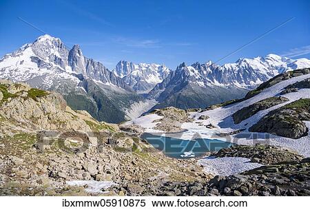 Stock Photography - Mountain panorama, Lac Blanc, mountain peaks, Aiguille Verte, Grandes Jorasses, Aiguille du Moine, Mont Blanc, Mont Blanc massif, Chamonix-Mont-Blanc, Haute-Savoie, France, Europe. Fotosearch
