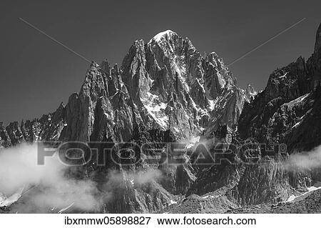 Mountain peak in clouds, Aiguille Verte, Chamonix, Haute-Savoie, France, Europe View Large Photo Image Stock Photo - Mountain peak in clouds, Aiguille Verte, Chamonix, Haute-Savoie, France, Europe. Fotosearch