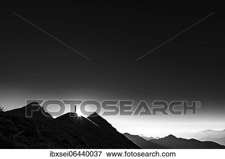Mountaineer on summit ridge with backlight, in the background Ammergau Alps, Reutte, Ammergau Alps, Tyrol, Austria, Europe View Large Photo Image Stock Photo - Mountaineer on summit ridge with backlight, in the background Ammergau Alps, Reutte, Ammergau Alps, Tyrol, Austria, Europe. Fotosearch