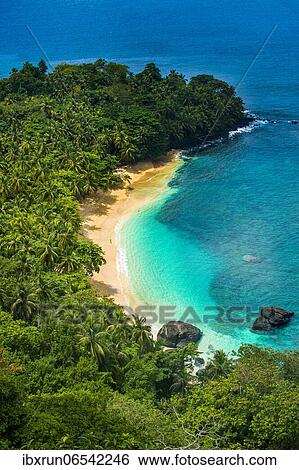 Stock Photograph - Overlook over banana beach, Unesco biosphere reserve, Principe, Sao Tome and Principe, Atlantic Ocean, Africa. Fotosearch