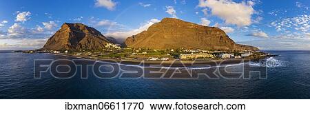 Panorama, beach between La Playa and La Puntilla in the back La Calera, rainbow, Valle Gran Rey, drone shot, La Gomera, Canary Islands, Spain, Europe View Large Photo Image Stock Image - Panorama, beach between La Playa and La Puntilla in the back La Calera, rainbow, Valle Gran Rey, drone shot, La Gomera, Canary Islands, Spain, Europe. Fotosearch