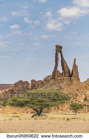 Ragged rock arch, Ennedi Plateau, Chad, Africa View Large Photo Image Stock Image - Ragged rock arch, Ennedi Plateau, Chad, Africa. Fotosearch