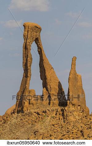 Ragged rock arch, Ennedi Plateau, Chad, Africa View Large Photo Image Stock Image - Ragged rock arch, Ennedi Plateau, Chad, Africa. Fotosearch
