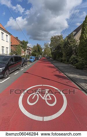 Red marked bicycle road, bicycle path, Münster, North Rhine-Westphalia, Germany, Europe View Large Photo Image Picture - Red marked bicycle road, bicycle path, Münster, North Rhine-Westphalia, Germany, Europe. Fotosearch