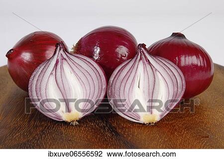 Red onions (Allium cepa) on wooden board, studio shot, Schleswig-Holstein, Germany, Europe View Large Photo Image Stock Image - Red onions (Allium cepa) on wooden board, studio shot, Schleswig-Holstein, Germany, Europe. Fotosearch