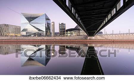 Reflection on the Spree at the main station with bridge and cube, Berlin, Germany, Europe View Large Photo Image Picture - Reflection on the Spree at the main station with bridge and cube, Berlin, Germany, Europe. Fotosearch