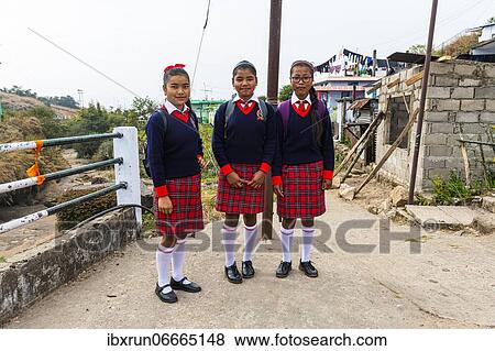 Stock Photo - School kids in uniform, Sohra or Cherrapunjee, Meghalaya, India, Asia. Fotosearch