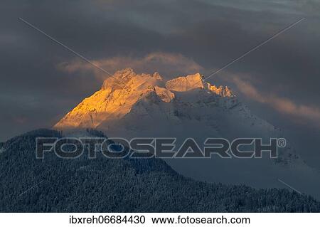 Small and large beggar's litter in winter, at sunrise, Karwendel Mountains, Terfens, Tyrol, Austria, Europe View Large Photo Image Stock Image - Small and large beggar's litter in winter, at sunrise, Karwendel Mountains, Terfens, Tyrol, Austria, Europe. Fotosearch
