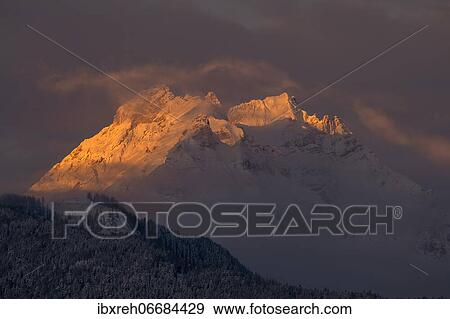 Stock Photo - Small and large beggar's litter in winter, at sunrise, Karwendel Mountains, Terfens, Tyrol, Austria, Europe. Fotosearch