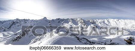 Snowy mountain range, summit panorama in winter, Zischgeles, Stubai Alps, Tyrol, Austria, Europe View Large Photo Image Stock Photo - Snowy mountain range, summit panorama in winter, Zischgeles, Stubai Alps, Tyrol, Austria, Europe. Fotosearch