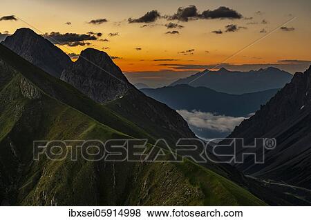 Steep mountain meadow of the Habart ridge in the foreground with mountains of the Maldon ridge in the background at sunrise, Elmen, Lechtal Alps, Außerfern, Tyrol, Austria, Europe View Large Photo Image Stock Photo - Steep mountain meadow of the Habart ridge in the foreground with mountains of the Maldon ridge in the background at sunrise, Elmen, Lechtal Alps, Außerfern, Tyrol, Austria, Europe. Fotosearch