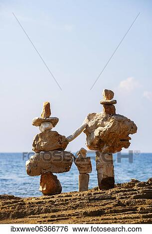 Stone figures on the beach, Novigrad, Adriatic coast, Istria, Croatia, Europe View Large Photo Image Stock Photograph - Stone figures on the beach, Novigrad, Adriatic coast, Istria, Croatia, Europe. Fotosearch