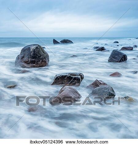 Stormy winter day at the Baltic Sea, boulders in the surf, Baltic resort Rerik, Mecklenburg-Western Pomerania, Germany, Europe View Large Photo Image Stock Photograph - Stormy winter day at the Baltic Sea, boulders in the surf, Baltic resort Rerik, Mecklenburg-Western Pomerania, Germany, Europe. Fotosearch