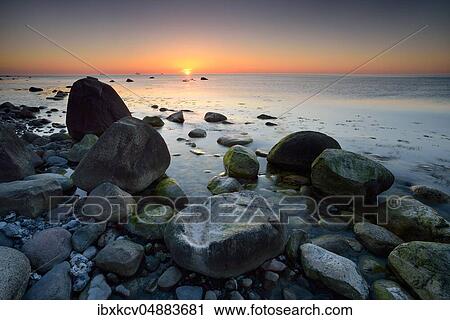 Sunrise at the Baltic Sea, Large erratic blocks, Jasmund National Park, Rügen Island, Mecklenburg-Western Pomerania, Germany, Europe View Large Photo Image Stock Image - Sunrise at the Baltic Sea, Large erratic blocks, Jasmund National Park, Rügen Island, Mecklenburg-Western Pomerania, Germany, Europe. Fotosearch