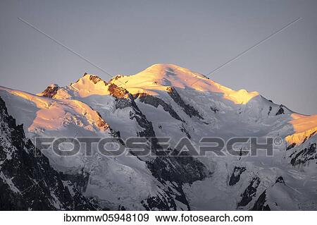 Stock Photo - Sunrise, Glacier des Bossons, summit of Mont Blanc with glacier, Mont Blanc massif, Chamonix-Mont-Blanc, Haute-Savoie, France, Europe. Fotosearch