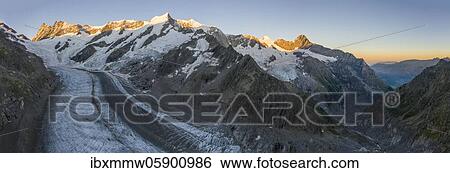 Sunrise, left Finsteraarhorn, Agassizhorn, Großes Fiescherhorn, middle Mönch and Eiger, upper ice sea, mountain panorama, high alpine landscape with mountains and glacier, Bernese Oberland, Switzerland, Europe View Large Photo Image Stock Photograph - Sunrise, left Finsteraarhorn, Agassizhorn, Großes Fiescherhorn, middle Mönch and Eiger, upper ice sea, mountain panorama, high alpine landscape with mountains and glacier, Bernese Oberland, Switzerland, Europe. Fotosearch