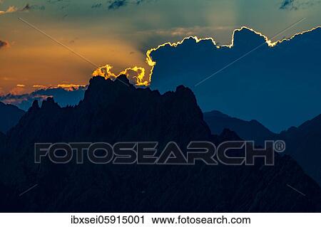 Stock Image - Sunrise over mountain peaks, Elmen, Lechtaler Alps, Außerfern, Tyrol, Austria, Europe. Fotosearch
