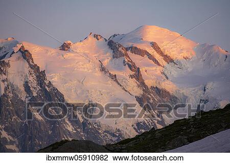 Stock Image - Sunset, Glacier des Bossons, summit of Mont Blanc with glacier, Mont Blanc massif, Chamonix-Mont-Blanc, Haute-Savoie, France, Europe. Fotosearch
