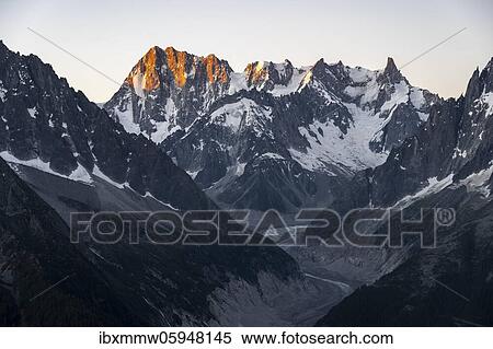 Sunset with alpenglow, view of glacier tongue, Mer de Glace, mountain peaks, Les Periades, Mont Blanc massif, Chamonix-Mont-Blanc, Rhône-Alpes, France, Europe View Large Photo Image Stock Photography - Sunset with alpenglow, view of glacier tongue, Mer de Glace, mountain peaks, Les Periades, Mont Blanc massif, Chamonix-Mont-Blanc, Rhône-Alpes, France, Europe. Fotosearch