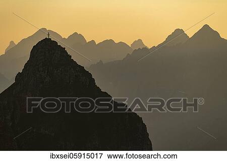 Stock Photo - Sunset with summit of the Pfeilspitze, Elmen, Allgäuer Alps, Außerfern, Tyrol, Austria, Europe. Fotosearch