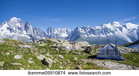 Tent in the mountains, in the back Grand Balcon North, Aiguille Verte and Aiguille du Midi, Grandes Jorasses, Mont Blanc Massif, Chamonix-Mont-Blanc, Haute-Savoie, France, Europe View Large Photo Image Picture - Tent in the mountains, in the back Grand Balcon North, Aiguille Verte and Aiguille du Midi, Grandes Jorasses, Mont Blanc Massif, Chamonix-Mont-Blanc, Haute-Savoie, France, Europe. Fotosearch