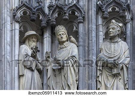 Three figures of saints at the entrance portal in detail, Lamberti Church, Münster, North Rhine-Westphalia, Germany, Europe View Large Photo Image Stock Image - Three figures of saints at the entrance portal in detail, Lamberti Church, Münster, North Rhine-Westphalia, Germany, Europe. Fotosearch