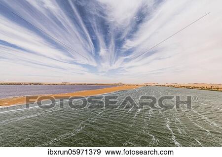 Two coloured lake as part of the the Unesco sight Ounianga lakes, northern Chad, Africa View Large Photo Image Stock Photo - Two coloured lake as part of the the Unesco sight Ounianga lakes, northern Chad, Africa. Fotosearch
