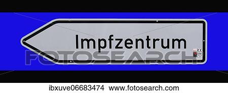 Vaccination centre sign, traffic sign on blue background, Schleswig-Holstein, Germany, Europe View Large Photo Image Picture - Vaccination centre sign, traffic sign on blue background, Schleswig-Holstein, Germany, Europe. Fotosearch
