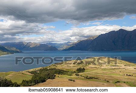 View of Lake Hawea, lake and mountain landscape, view from the hiking trail to Isthmus Peak, Wanaka, Otago, South Island, New Zealand, Oceania View Large Photo Image Stock Image - View of Lake Hawea, lake and mountain landscape, view from the hiking trail to Isthmus Peak, Wanaka, Otago, South Island, New Zealand, Oceania. Fotosearch