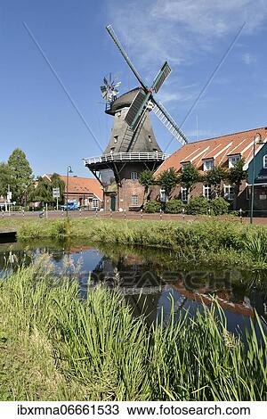 Stock Image - Windmill in Ostgroßefehn, East Frisia, Lower Saxony, Germany, Europe. Fotosearch